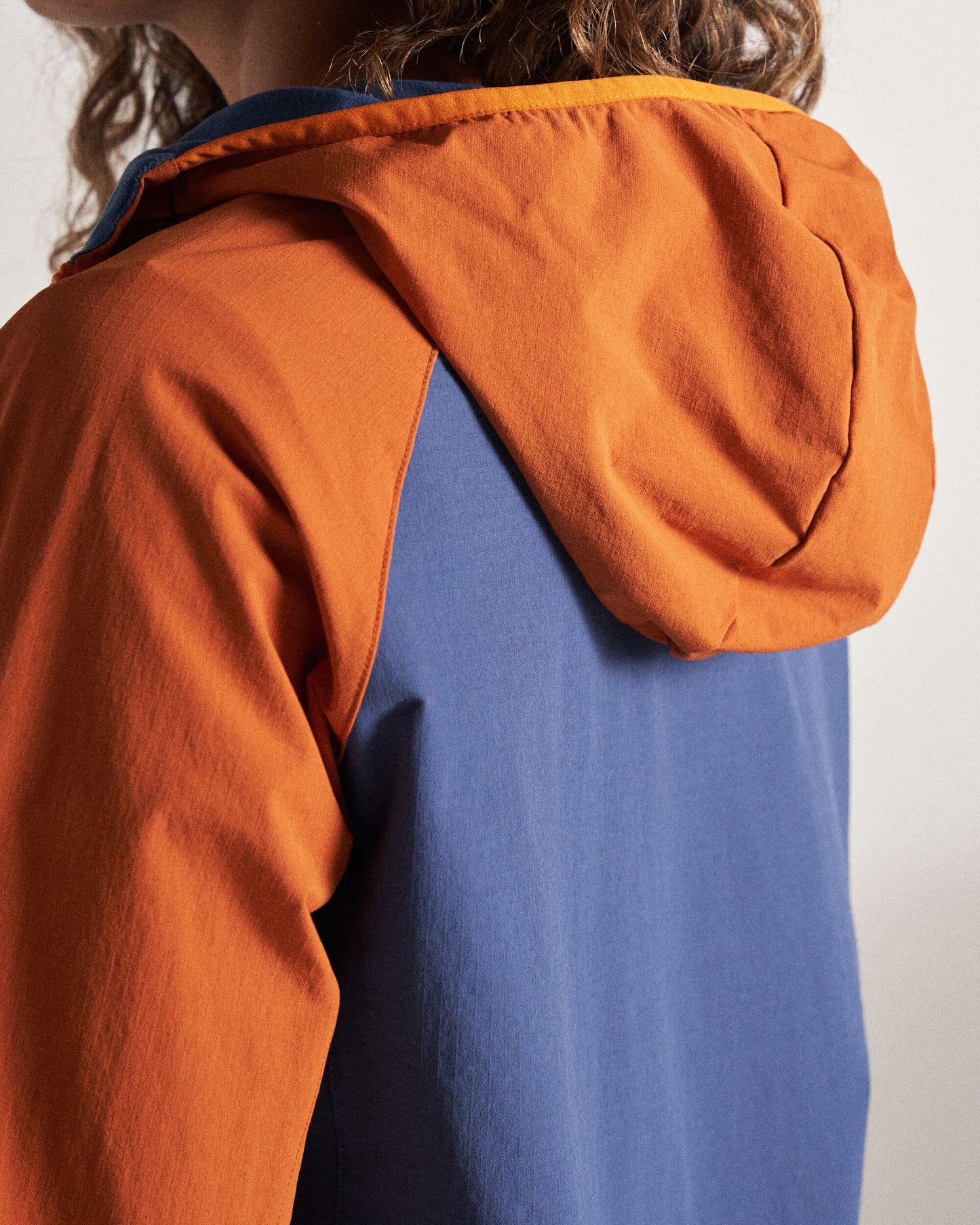 Ocean Light Recycled Softshell Jacket - Dark Denim/Sunset Orange - Studio Model