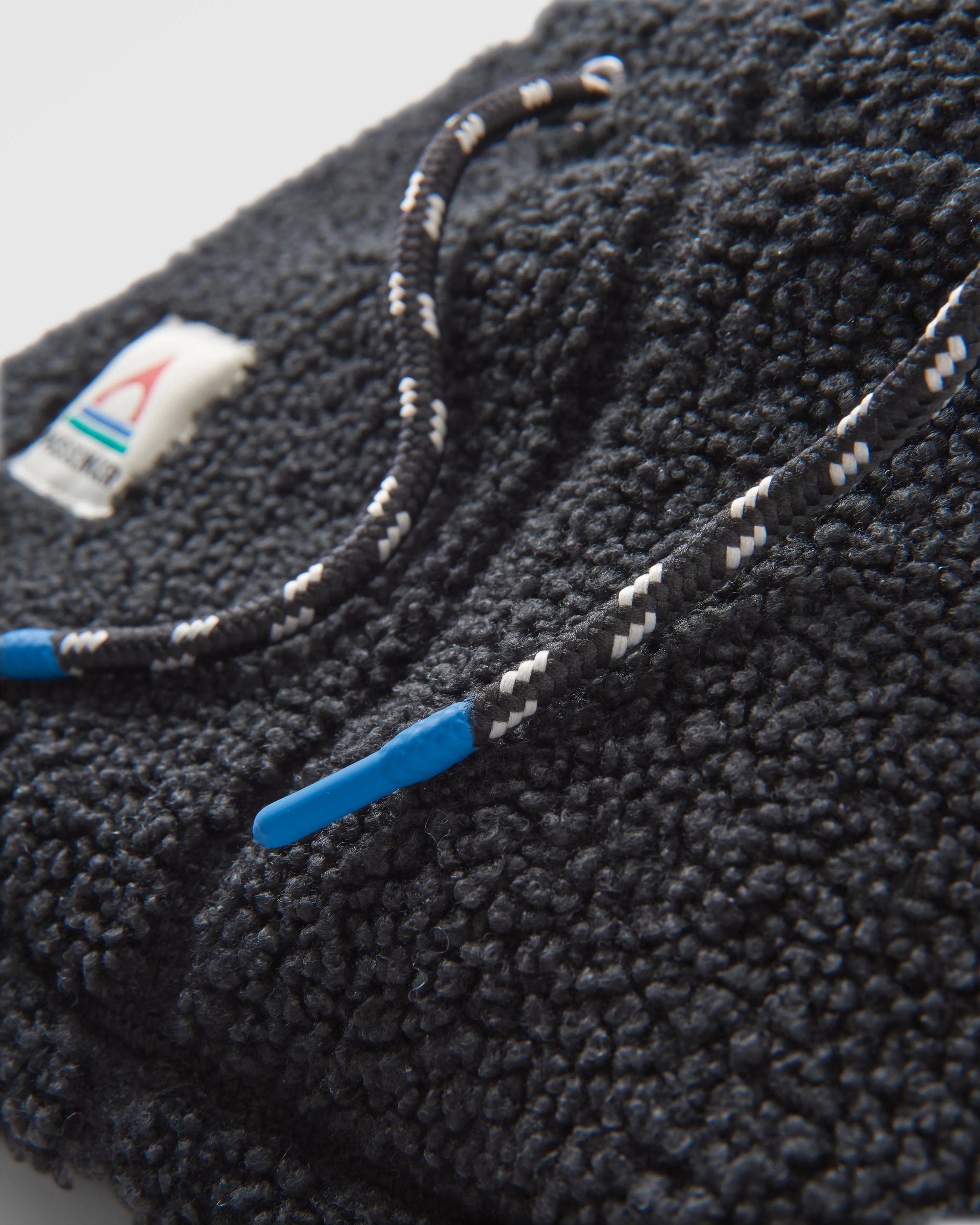 Snowdrift Recycled Fleece Hood - Black - Flatlay